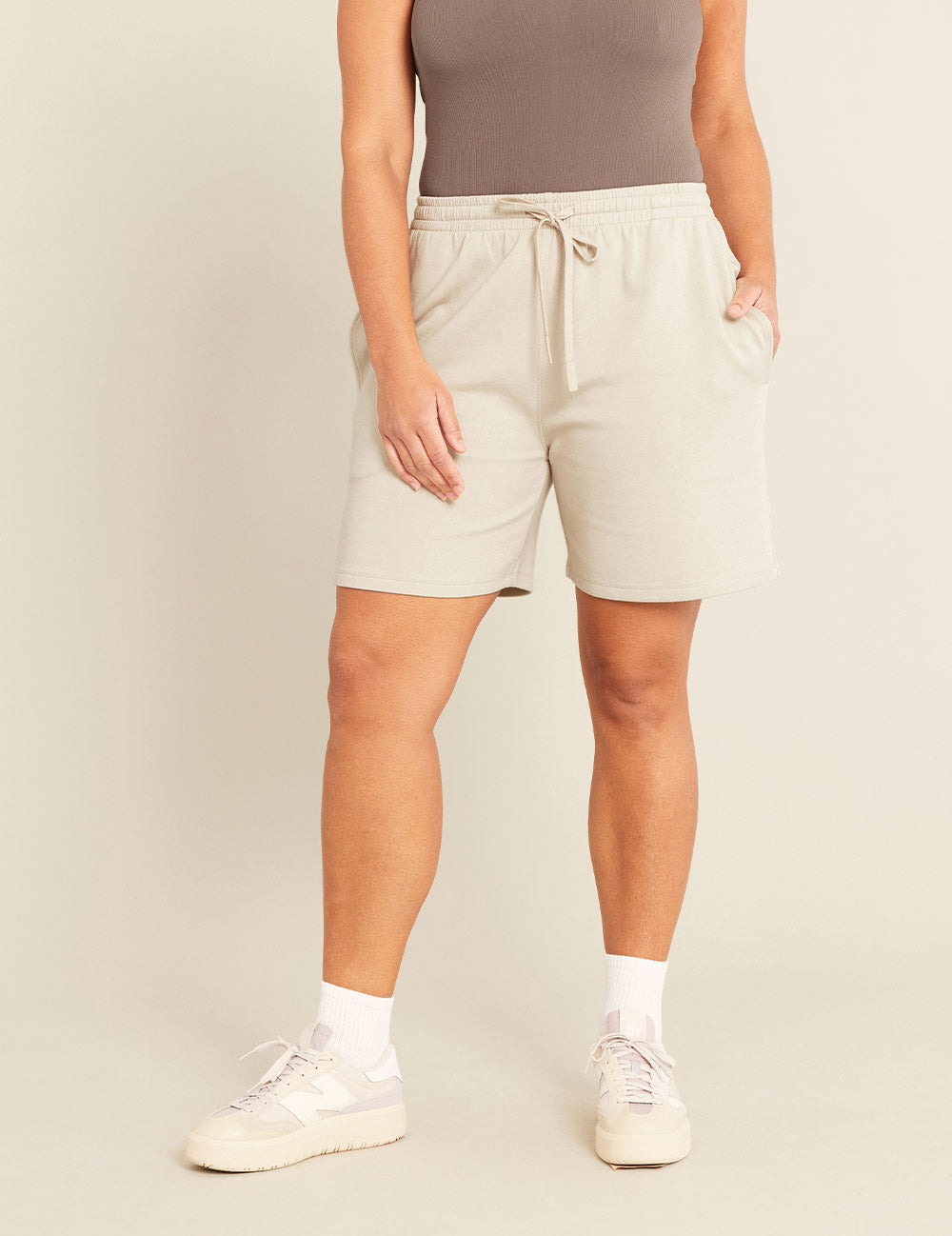 Gender-Neutral-6_-Sweat-Shorts-Sand-Female-Front.jpg