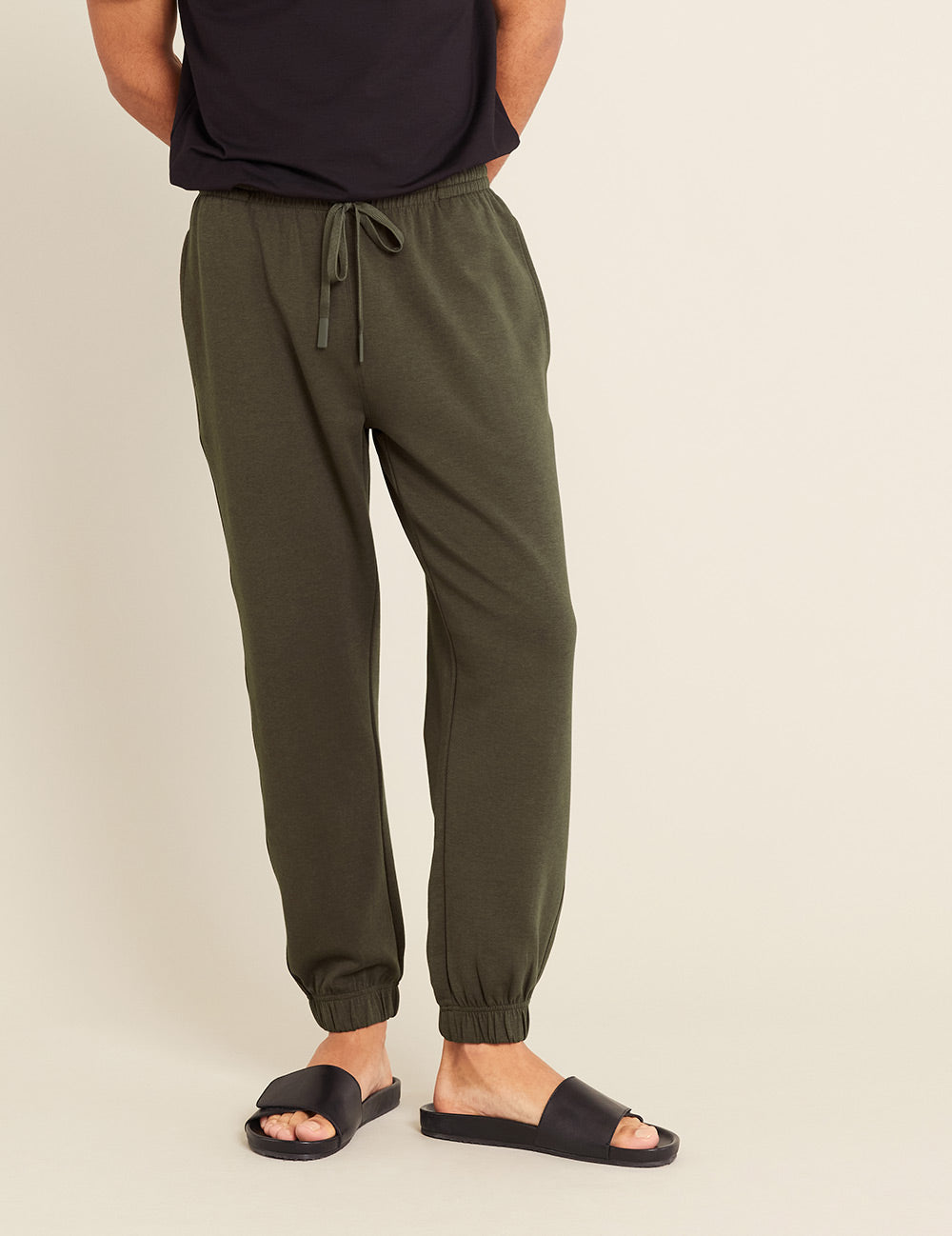 Gender-Neutral-Cuffed-Sweat-Pants-Dark-Olive-Male-Front.jpg