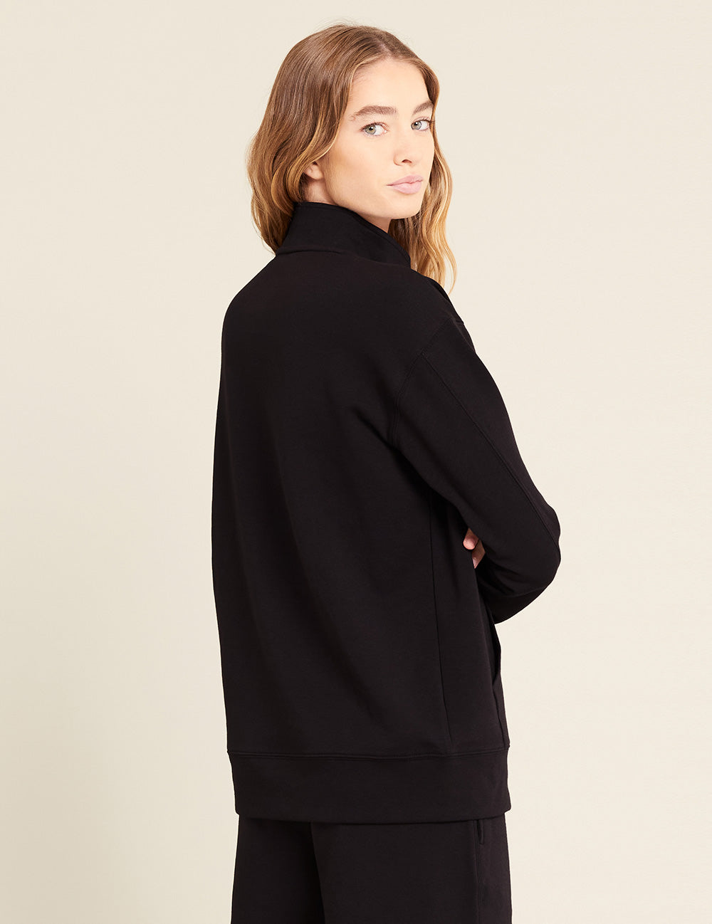 Gender-Neutral-Quarter-Zip-Sweater-Black-Female-Back.jpg